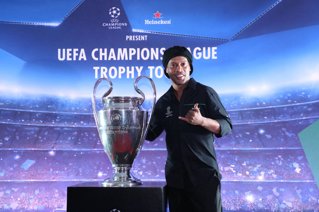 MEXICO CITY, MEXICO - MARCH 09: Ronaldinho poses with the UEFA Champions League Trophy during the UEFA Champions League Trophy Tour presented by Heineken on March 9, 2017 in Mexico City, Mexico. (Photo by Hector Vivas/Getty Images)